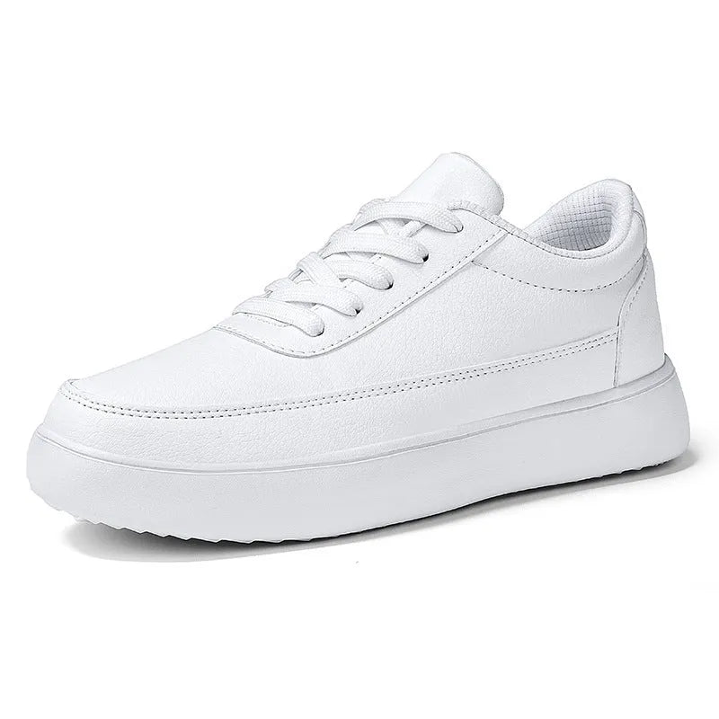 Women's white leather lace-up casual flat shoes on a plain background