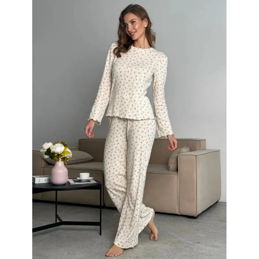 Women's white floral print pyjama suit with bell sleeve top and wide leg trousers