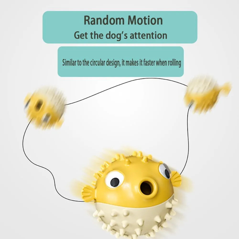Green fish-shaped dog toy with squeaky bell and treat-dispensing opening
