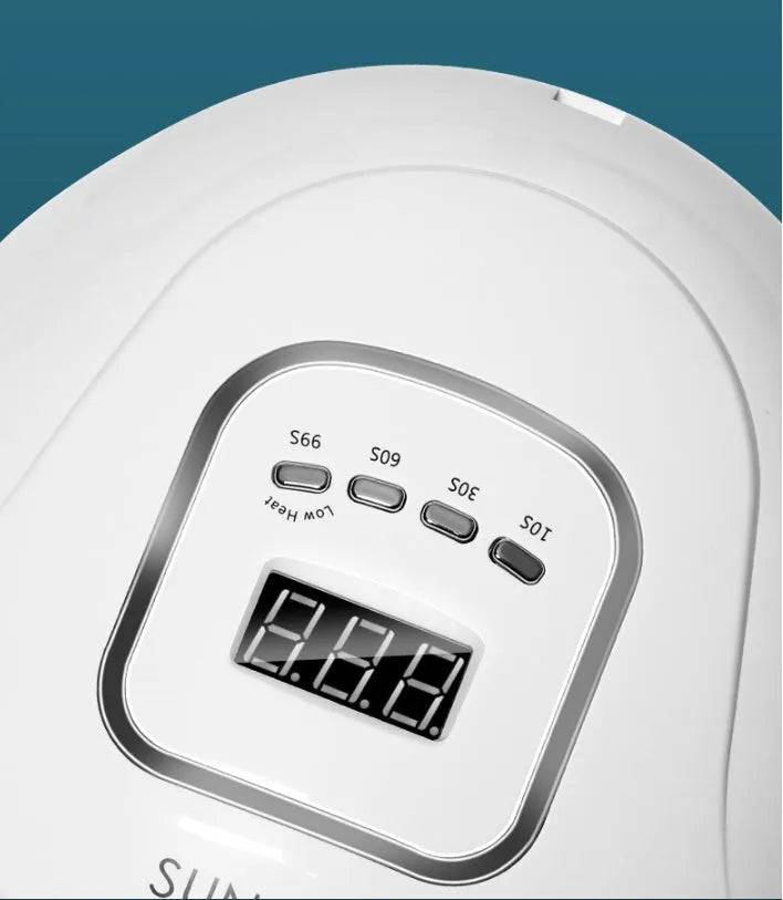 White nail polish baking lamp with UV LED lights and timer controls for gel manicure drying