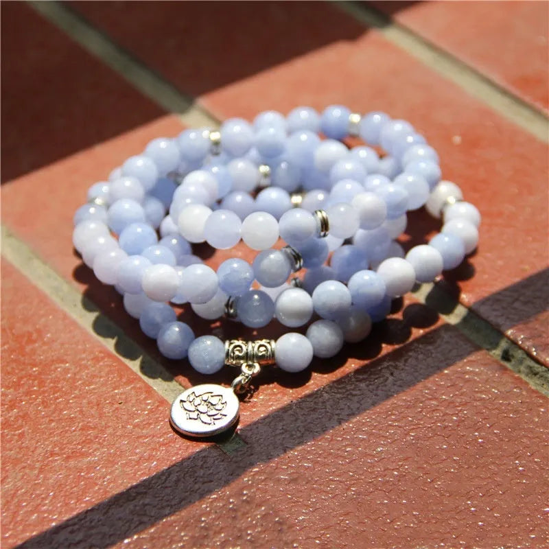 Natural stone women's bracelet with angel echeveria and lotus charm on wrist