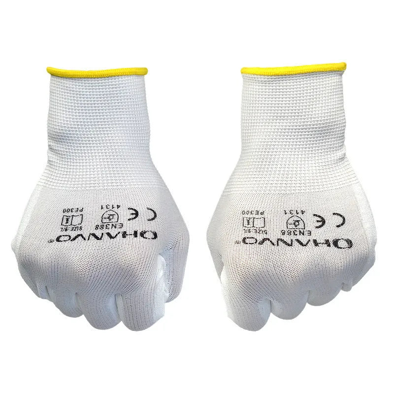 White PU coated labour gloves showing palm with textured coating, laid flat to show 24cm length.