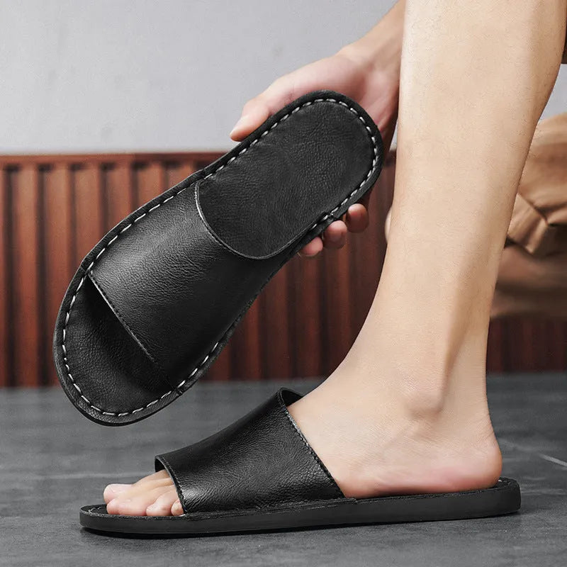 Men's brown and black leather outdoor sandals with rubber soles on size display