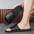 Men's brown and black leather outdoor sandals with rubber soles on size display