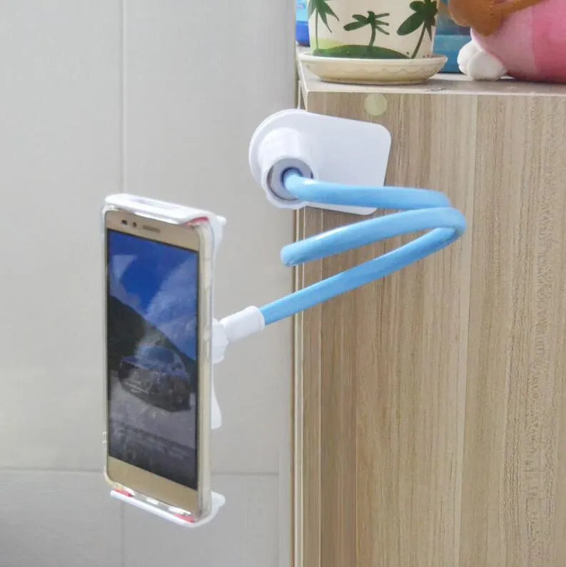Black aluminium alloy bedside phone stand with a long flexible arm holding a mobile phone on a table.