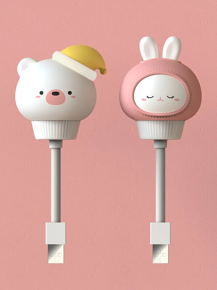 USB portable cartoon animal LED night light in rabbit design with adjustable brightness settings.