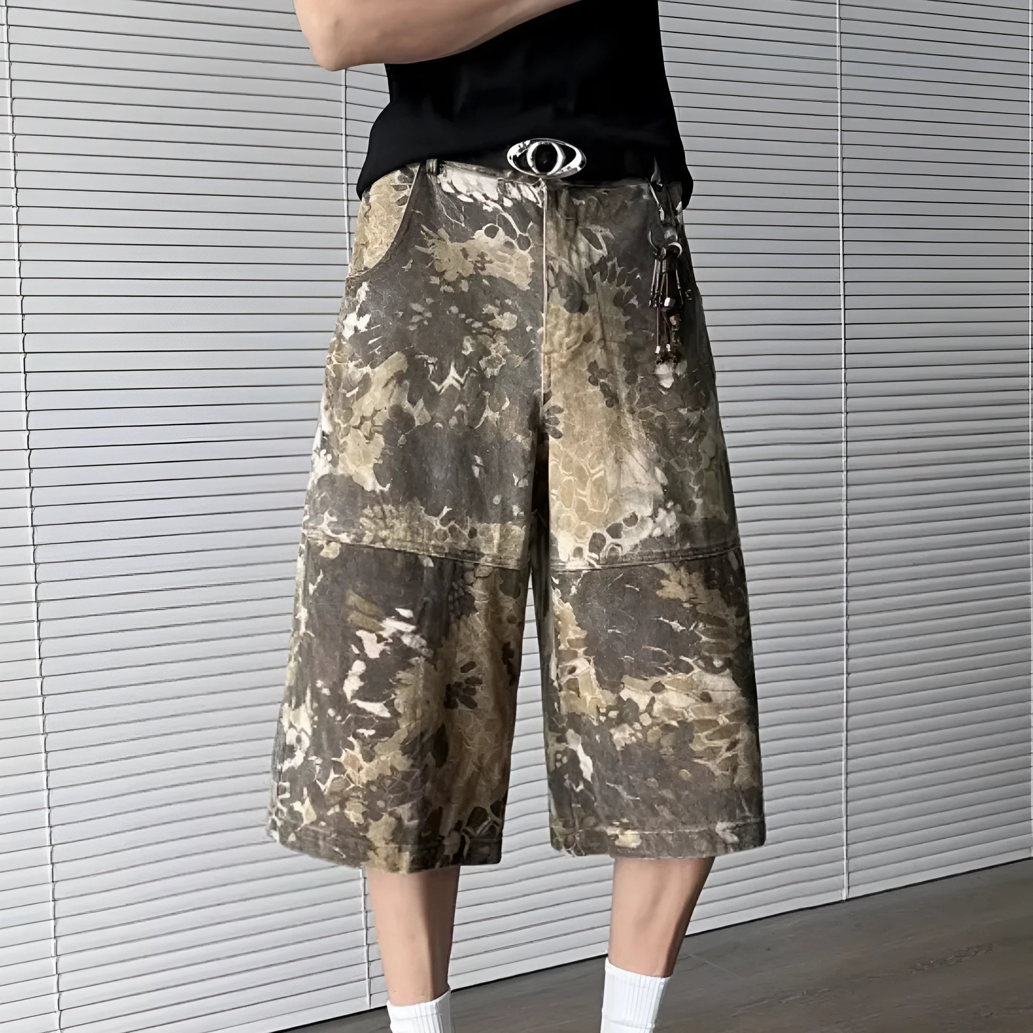 Yellow cotton denim cropped jeans with a snake camouflage pattern print.
