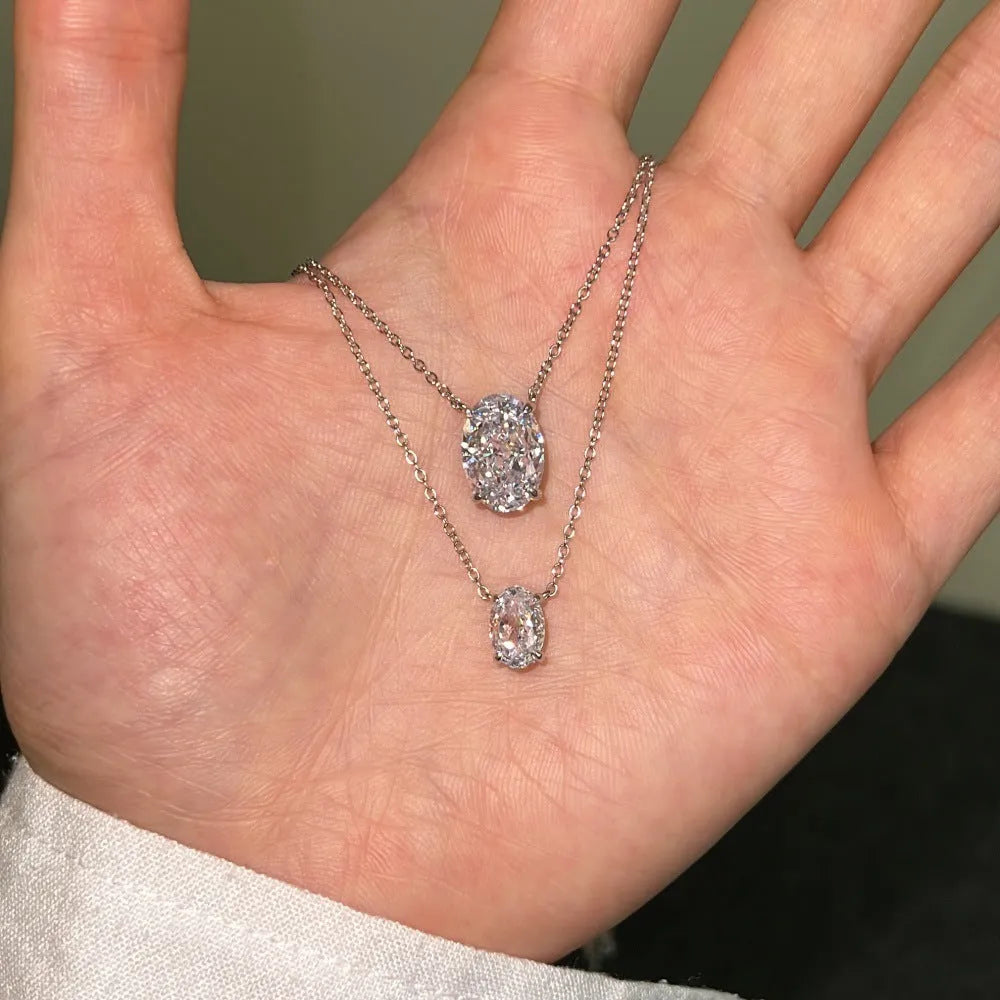 Sterling silver necklace with geometric oval ice flower pendant in gold or platinum plating