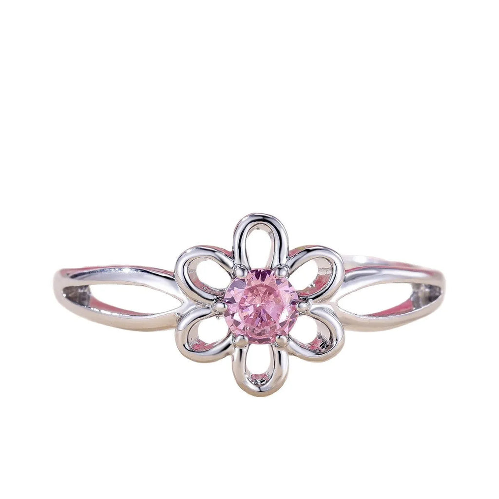 Women's fashion ring with hollowed flower pattern in electroplated copper, platinum pink diamond colour