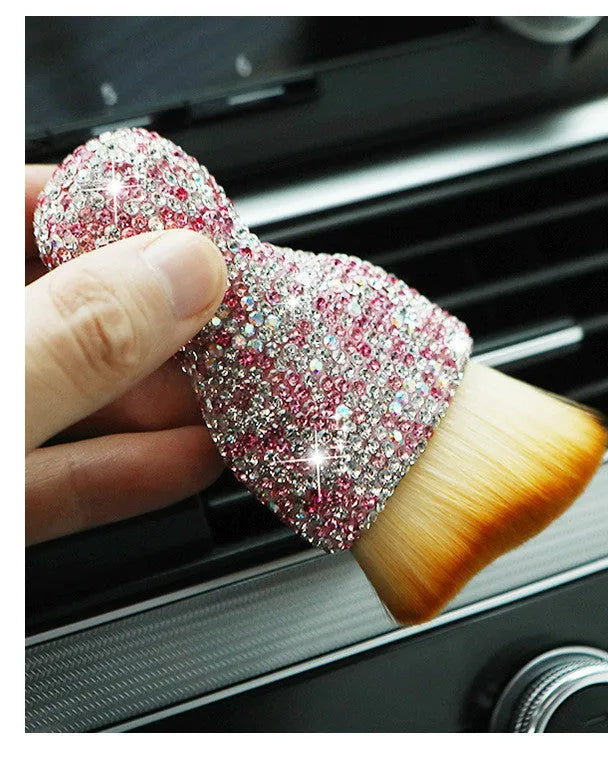 Soft PVC car interior cleaning brush for dust removal on dashboard and seats.