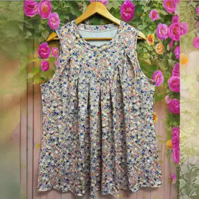 Plus size women's floral print sleeveless vest in loose fit, shown in black and khaki.