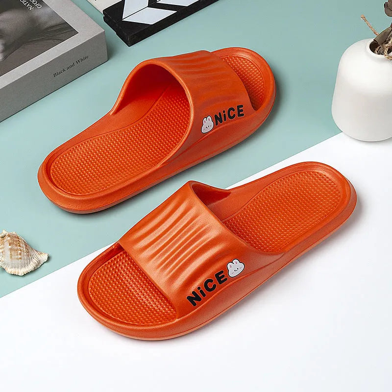Unisex adult EVA flip flop slippers with cartoon pattern in multiple colours on a non-slip sole.