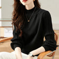 Women's slim fit half turtleneck bottoming shirt in a sunken stripe design, shown in apricot colour.