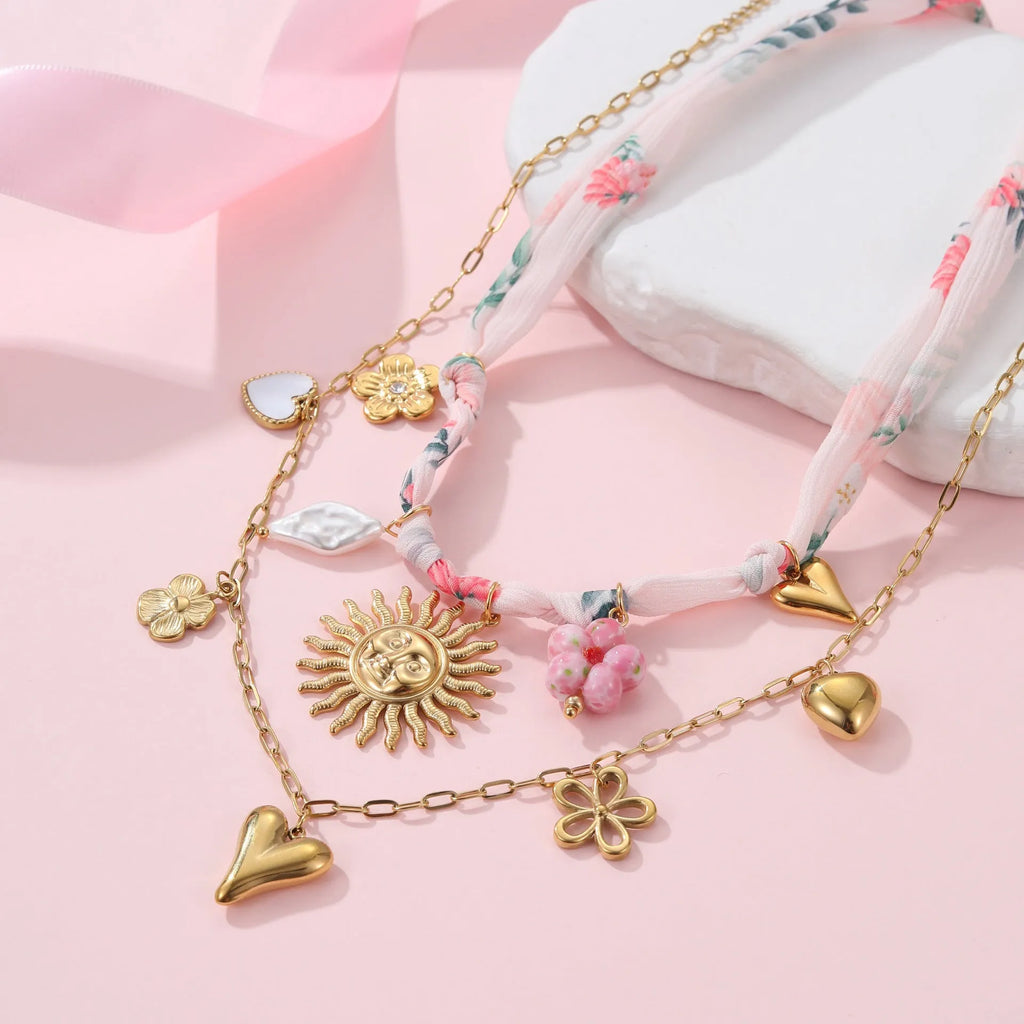 Stainless steel necklace with geometric sun pendant on adjustable 41-50cm chain