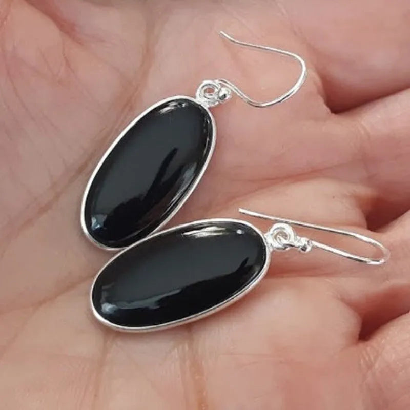 Women's oval black agate pendant earrings with geometric design and electroplated 925 silver finish