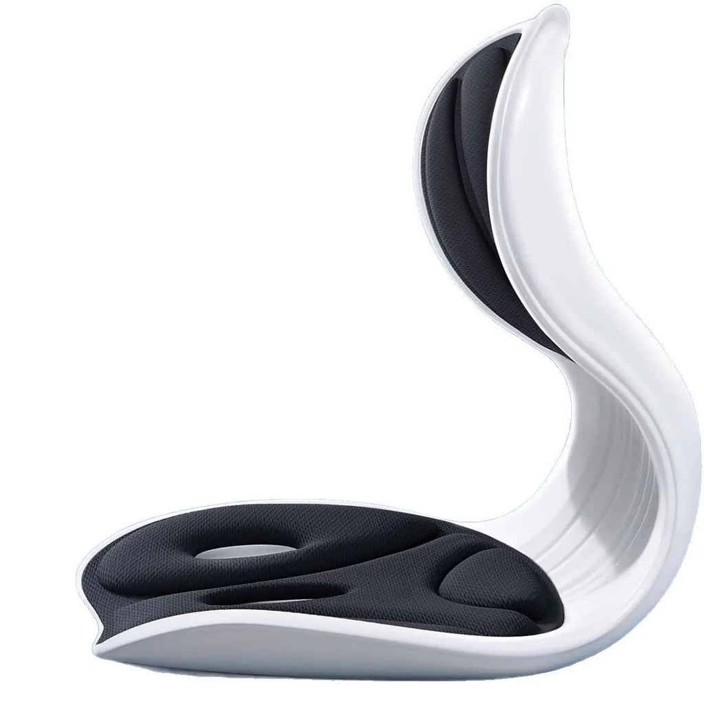 Grey lumbar support cushion with contoured shape for lower back, placed on office chair