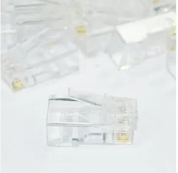 White network modular plug showing three-fork gold-plated contacts and all-copper insert construction