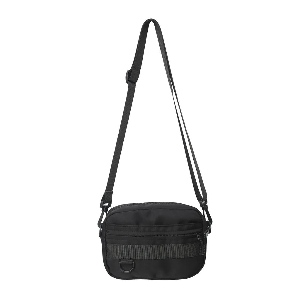 Men's solid color polyester nylon messenger bag with sewing thread detail and crossbody strap in black blue green or white