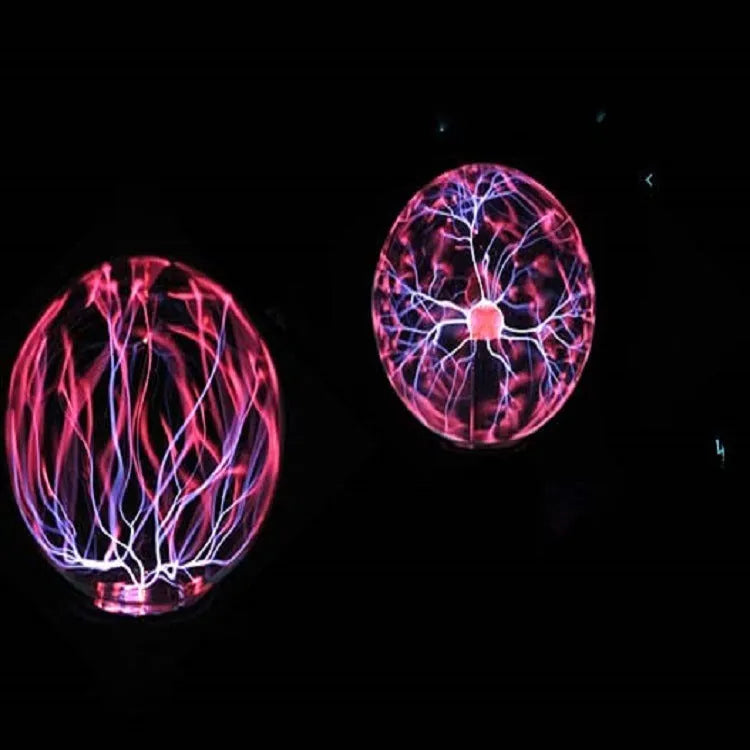 Magic light ball with colourful changing effects in 7.62cm glass sphere on ABS base