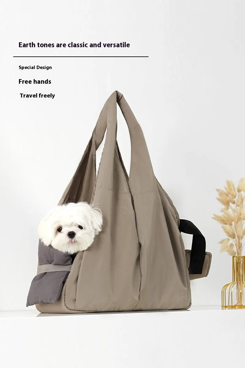 Apricot coloured cloth pet handbag with breathable mesh, shown with dimensions 41cm by 16cm by 28cm