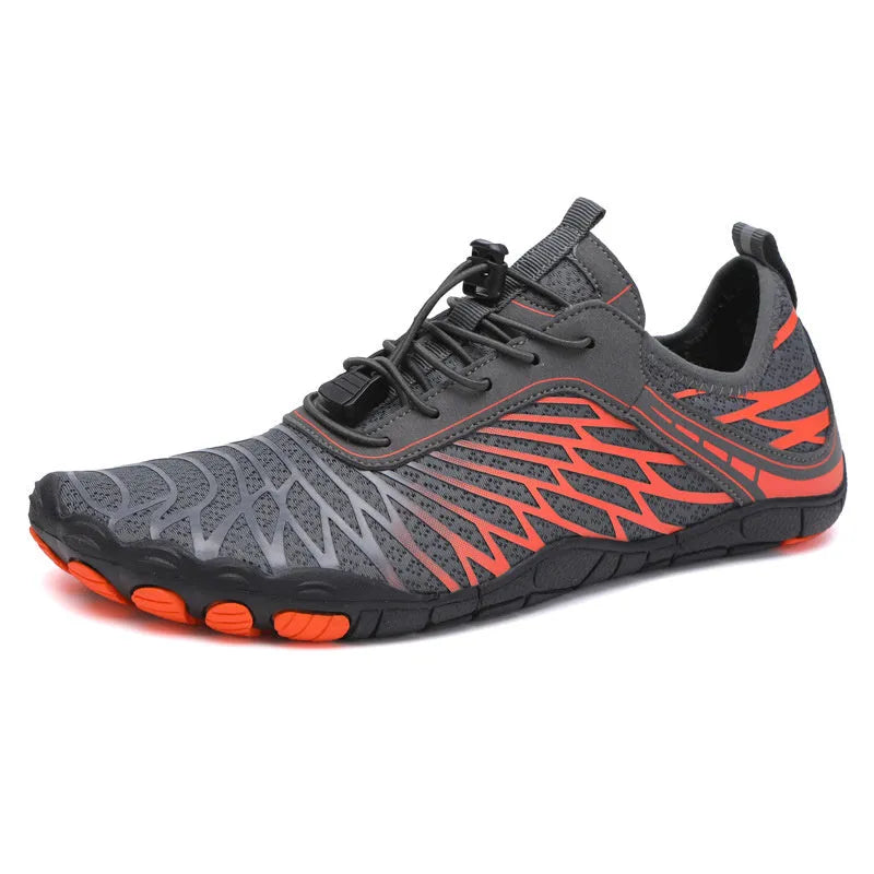 White and pink lace-up sports shoes with rubber sole on a plain background