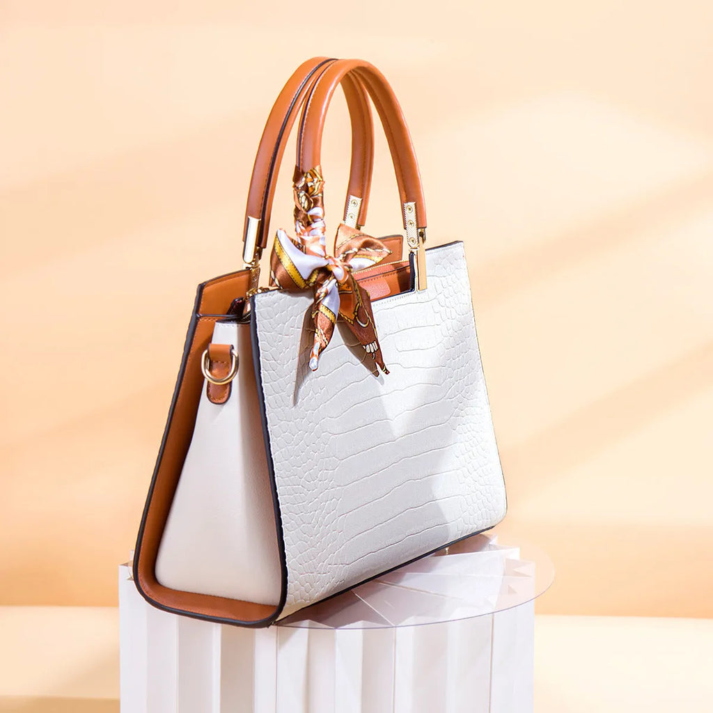 Milky white women's large-capacity PU shoulder handbag with multiple internal compartments and an external slit pocket.