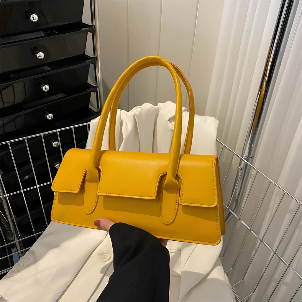 Women's small horizontal square shoulder bag in PU leather with visible stitching in a choice of colours