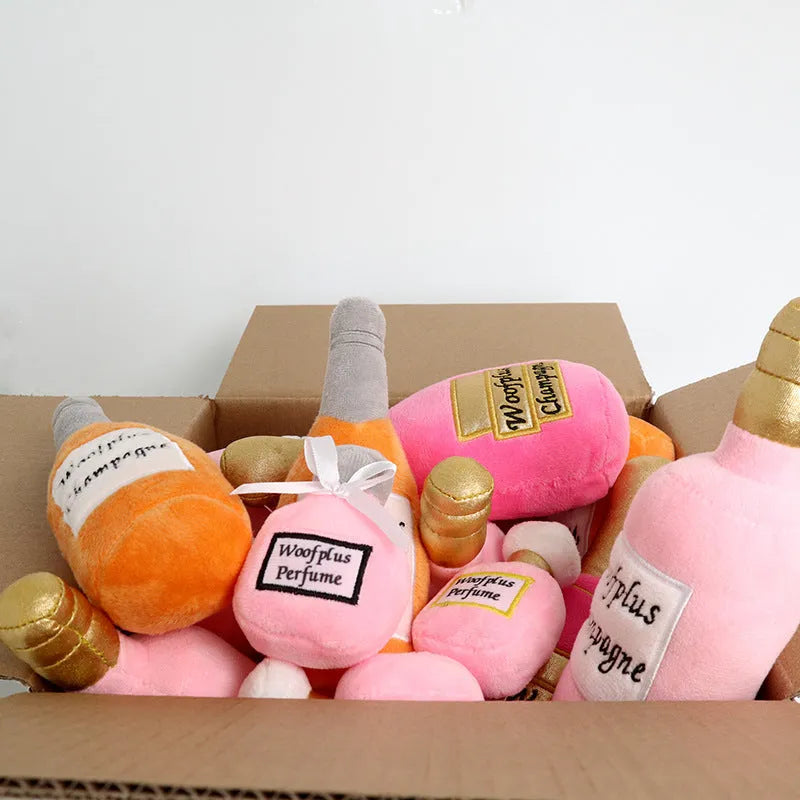 Plush wine bottle shaped dog toy with squeaker in various colour options