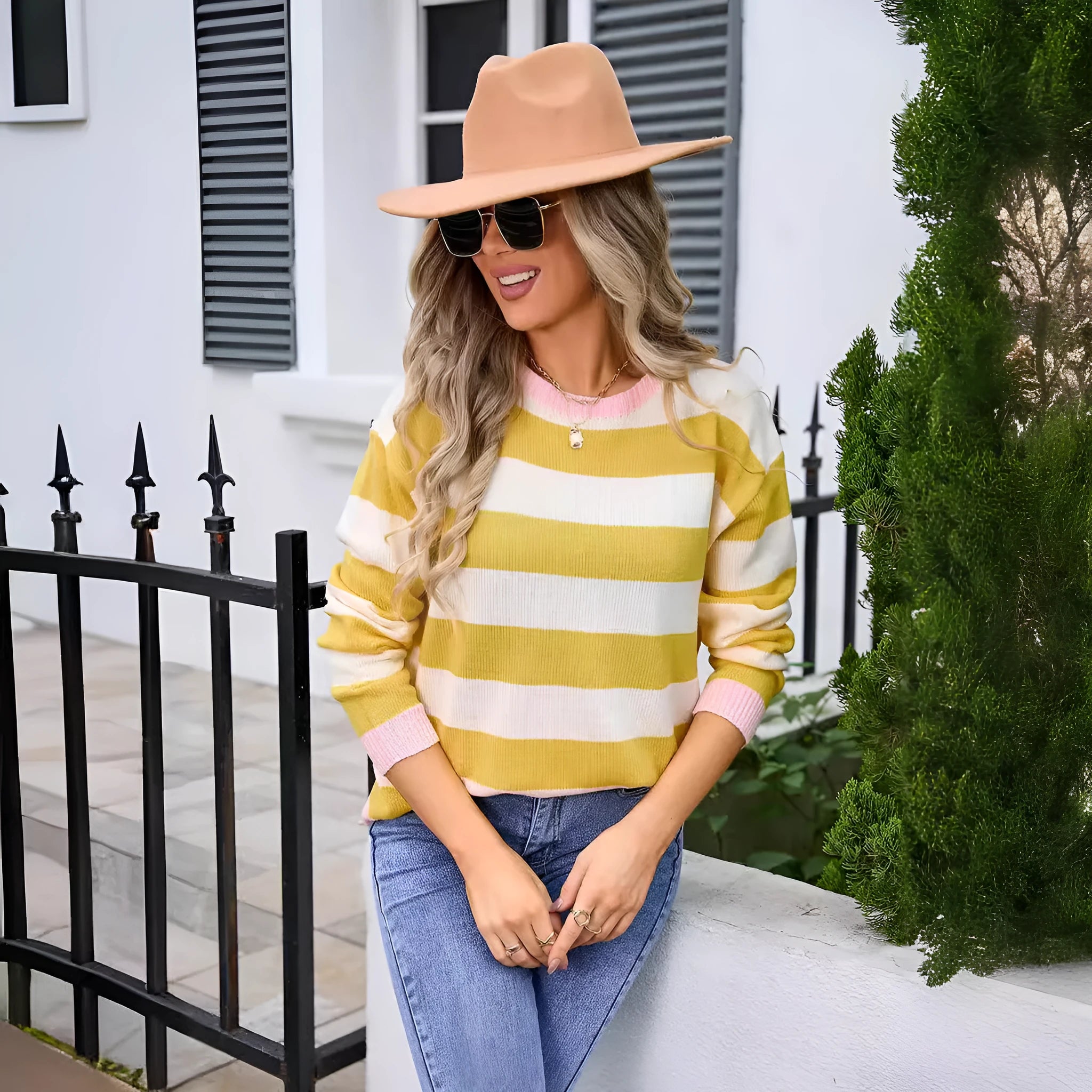 Women's loose fit acrylic sweater in blue colour with round neck and long sleeves