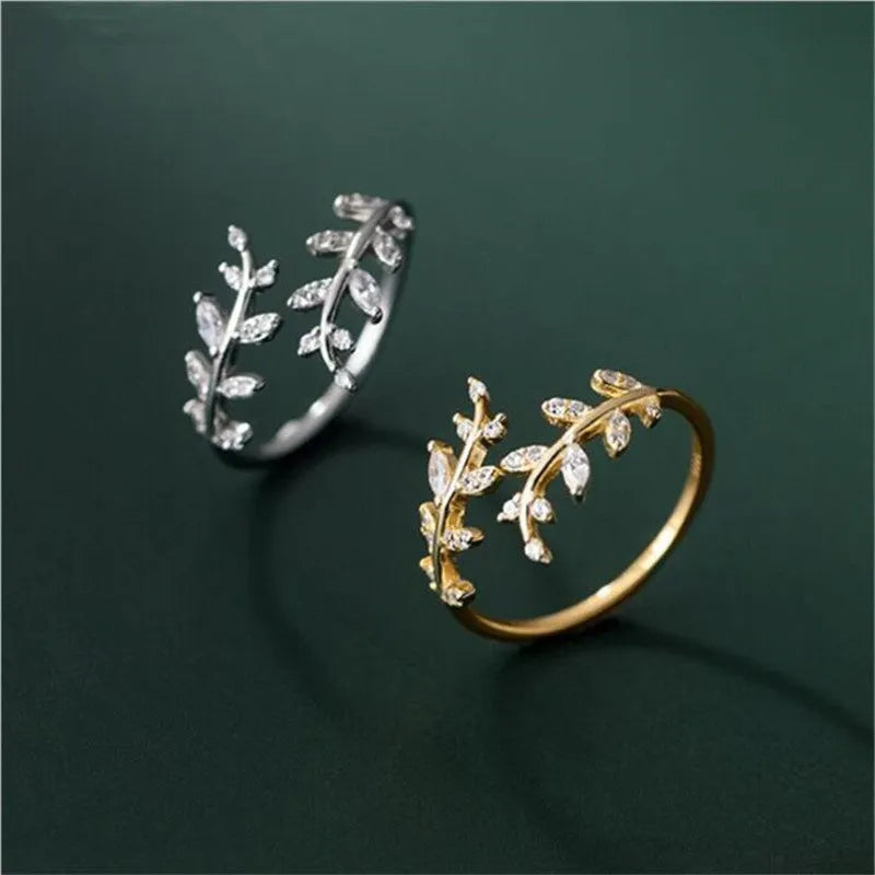 Women's copper electroplated leaf branch fashion ring in gold or silver geometric design