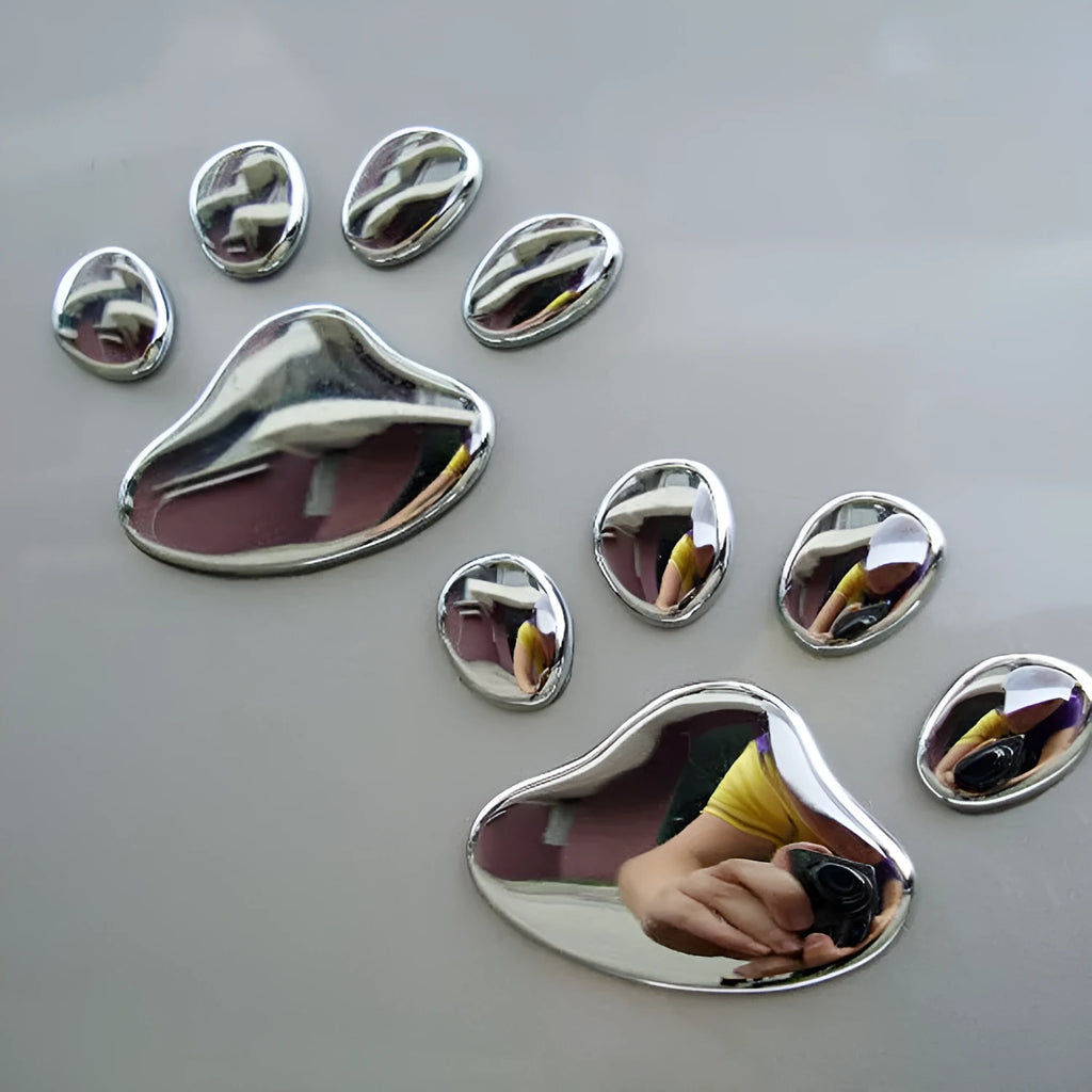 PVC car bumper sticker with hand-brushed dog footprints pattern in red, silver, gold, or black, 7cm long.