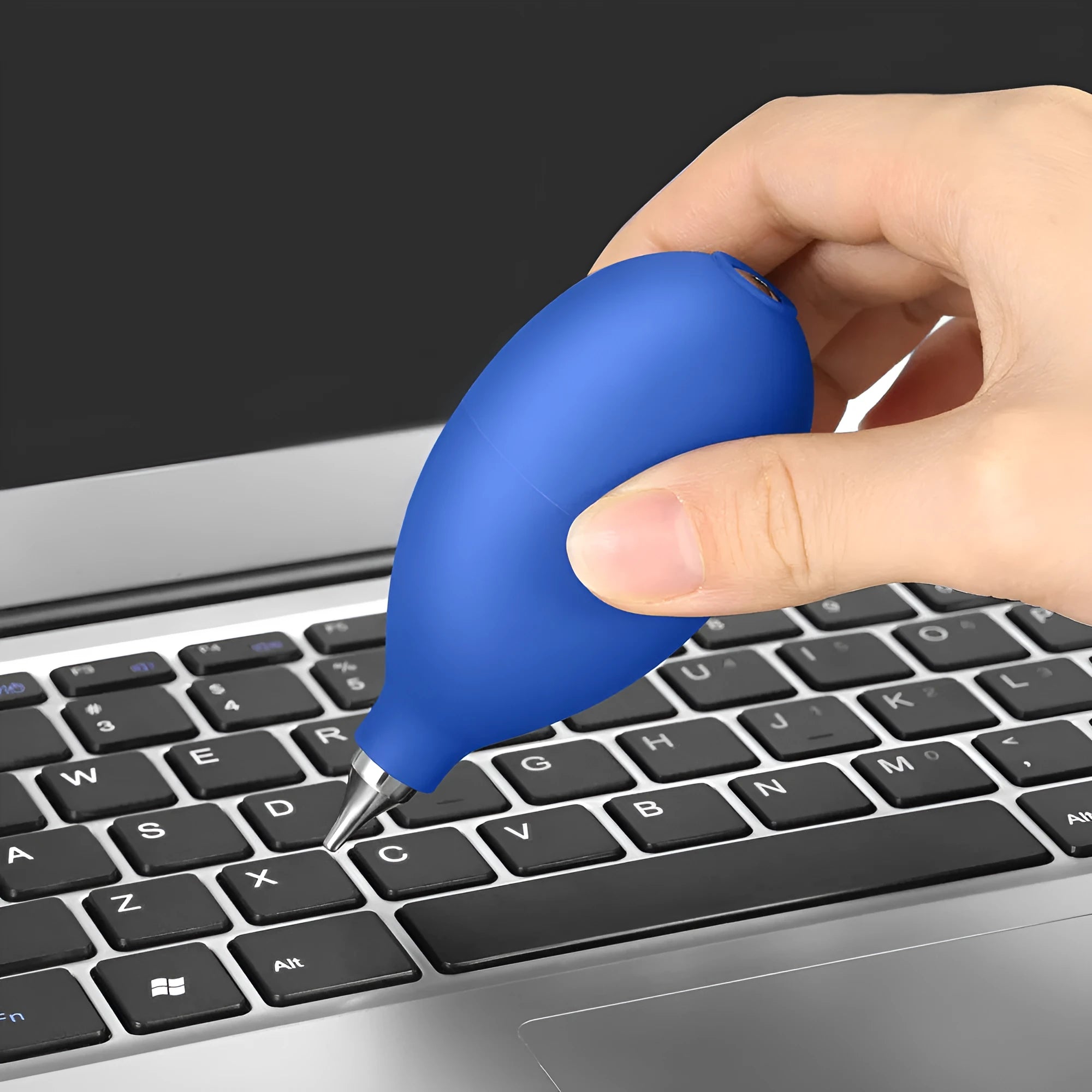 Blue and black rubber handheld dust removal air blower ball for cleaning cameras and phones.