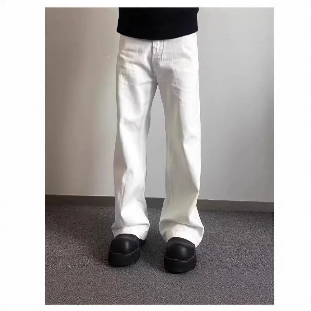 White straight-leg men's jeans with mid waist and zipper fly on mannequin
