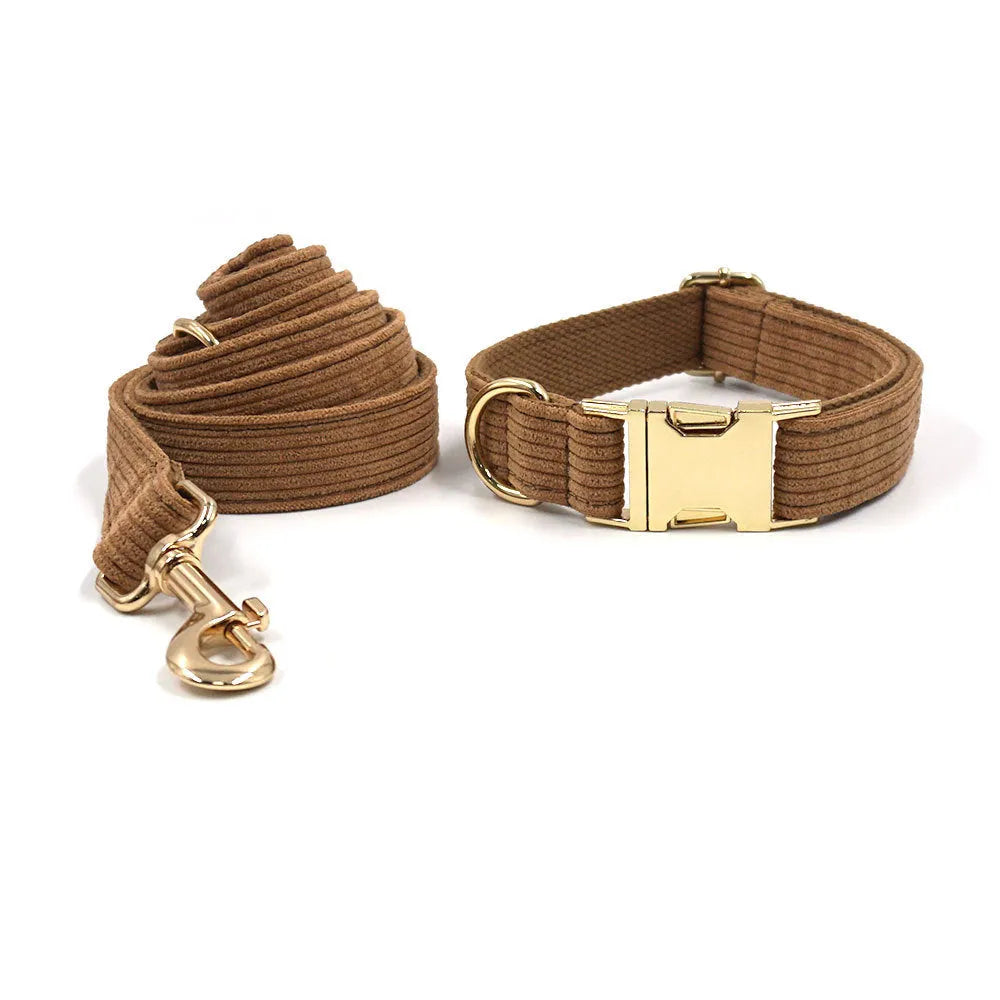 Brown corduroy five-piece pet set with collar, lead, bow, garbage pack and chest back in gold buckle detail