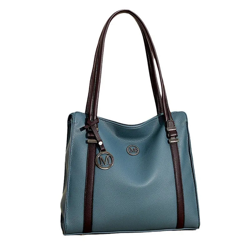 Women's large horizontal square PU leather crossbody bag in wine red colour.