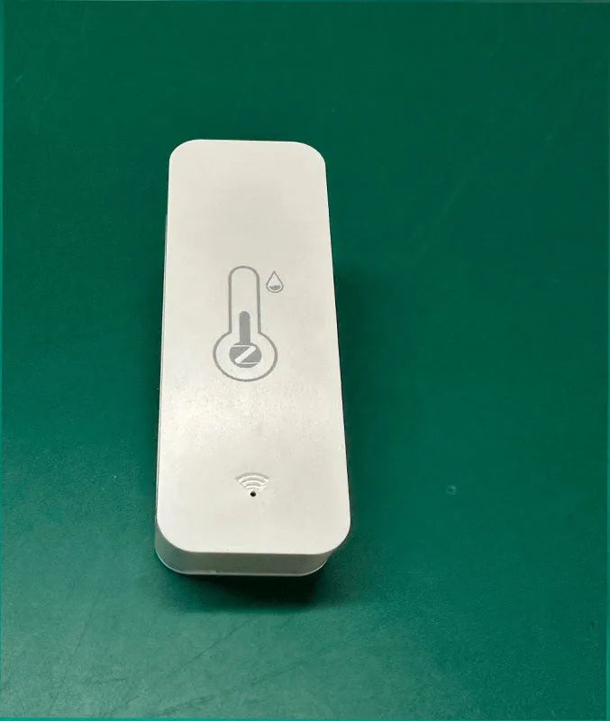 Compact white ABS temperature and humidity sensor with WiFi connectivity for wireless environmental monitoring