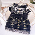 Golden gothic princess costume dress for a small dog or cat on a hanger.