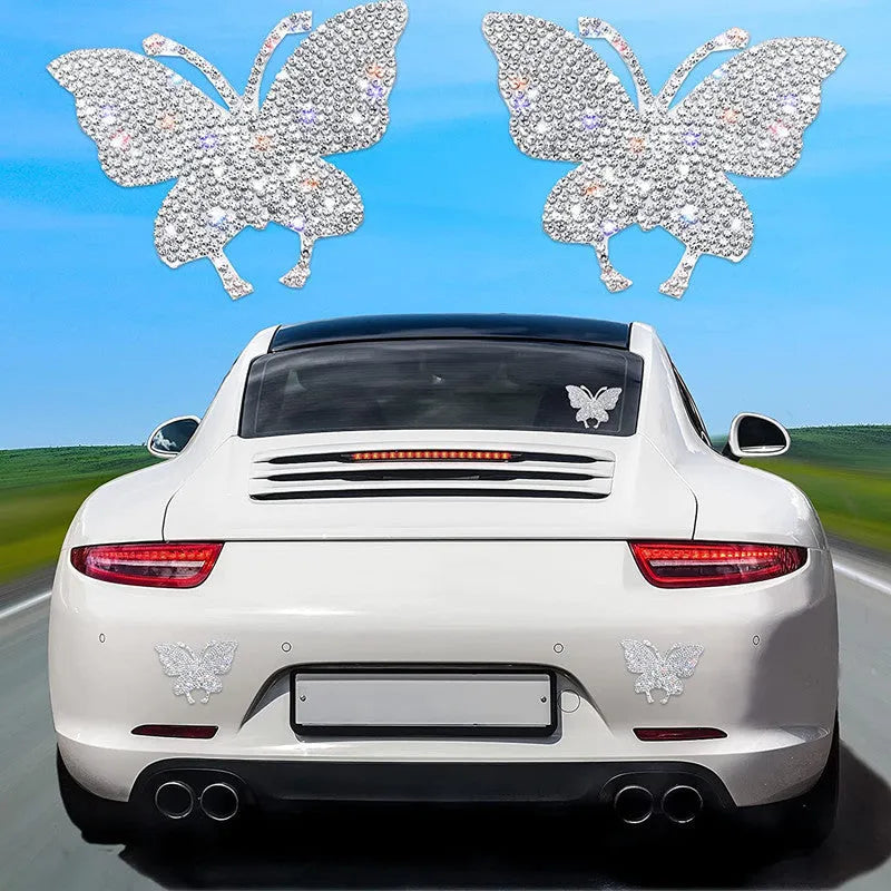 Close-up of white diamond series glass car sticker featuring butterfly and bear paw design measuring 7cm by 6cm