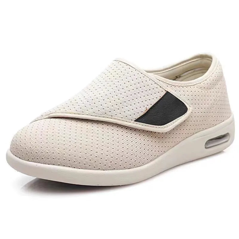 Beige leisure shoes with velcro fastening and widened round toe design