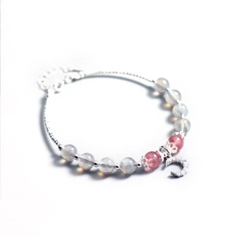 Moonstone handmade bracelet with crescent moon charm and adjustable extension chain.