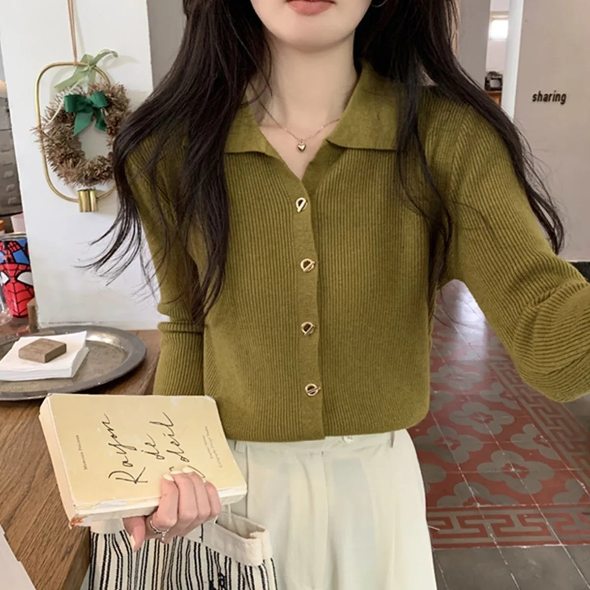 Women's beige loose-fit long-sleeved knitted cardigan top made from viscose fibre.