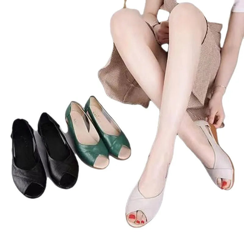Women's black peep toe sandals with an ankle buckle and a mid rubber heel.
