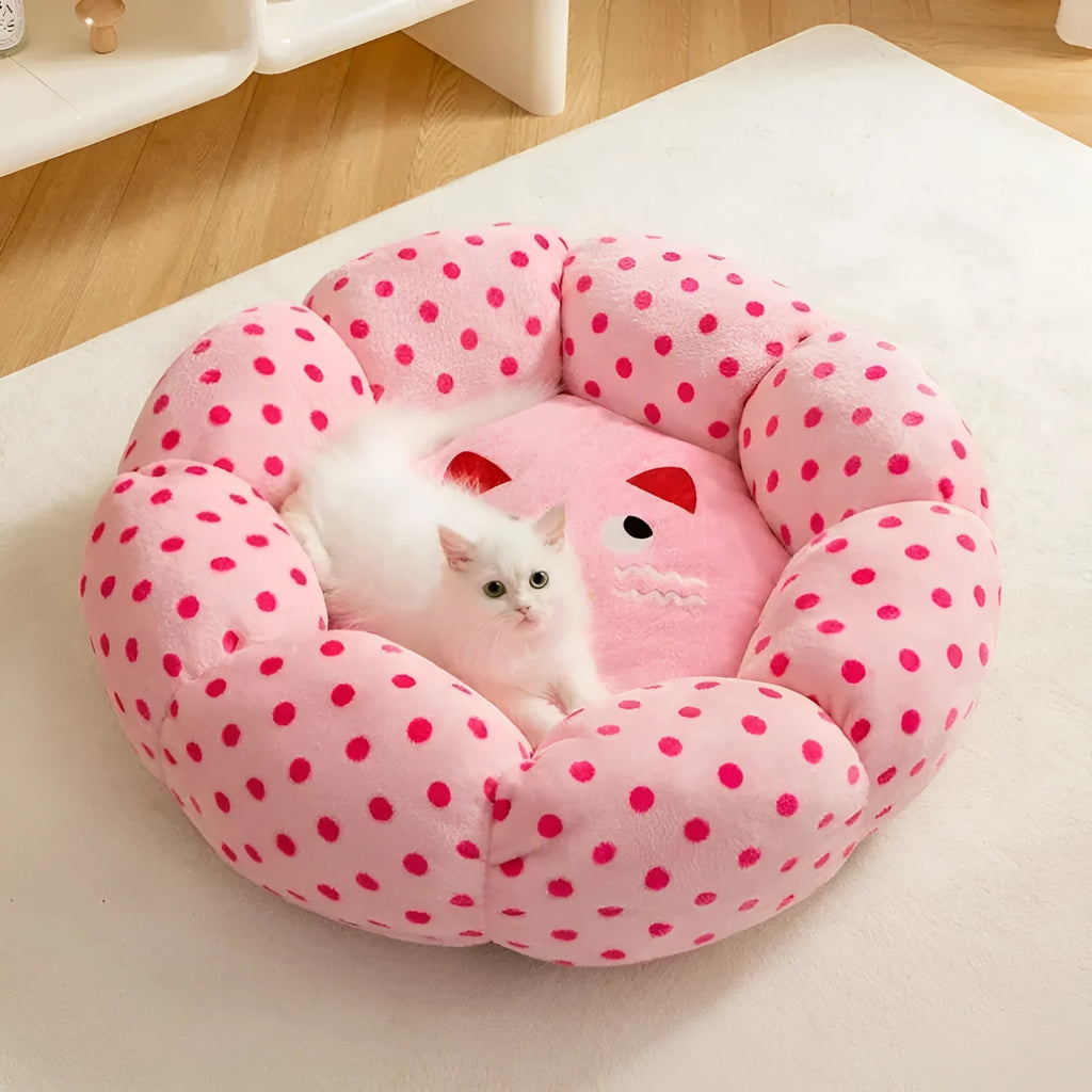 Pink dot fabric princess-style cat bed cushion shown in two sizes for small and medium cats.