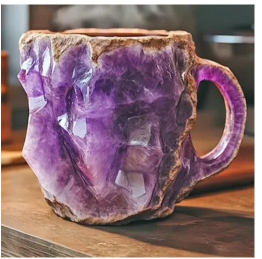 Resin mineral crystal coffee mug with handle in purple colour showing transparent construction