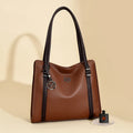 Women's large horizontal square PU leather crossbody bag in wine red colour.