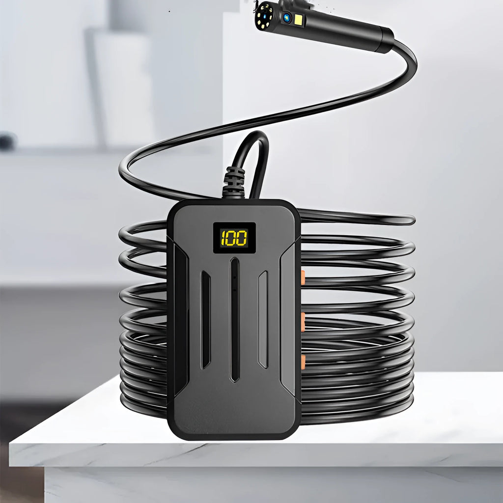F300 wireless dual lens endoscope camera with 5.5mm and 8mm probes, hook, and magnet attachments on a table.