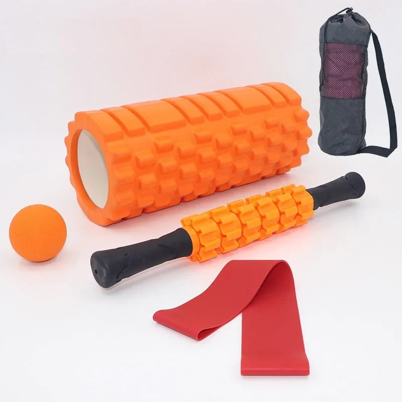 Black 33cm long fitness foam roller with six segmented pieces on a plain background.