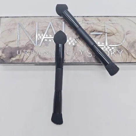 Double-headed concealer brush with black wooden handle and a miter sponge