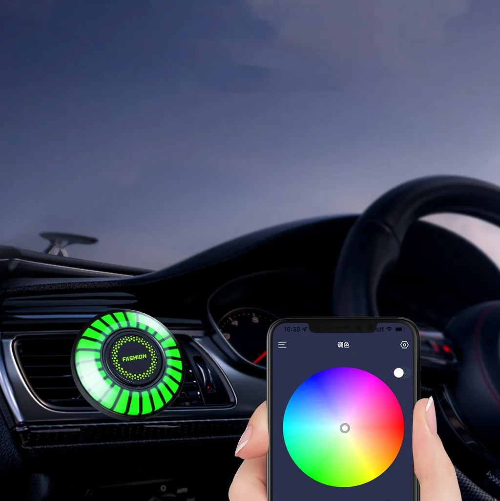 Car air vent aromatherapy unit with colourful RGB lights and a 3D vent clip attachment.