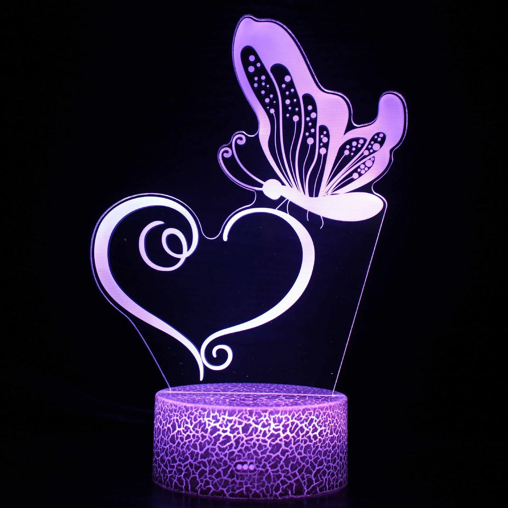Acrylic USB touch table lamp with 3D small night design on a small black ABS base.